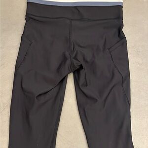 Athleta interval stash pocket high rise legging with piping color